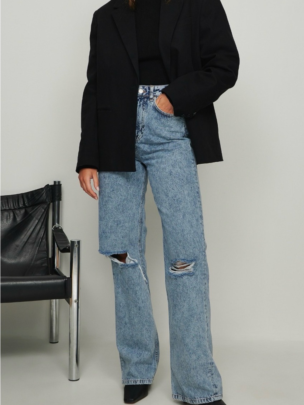 High-Rise Light Blue Flare Jeans with Knee Rips - Womens